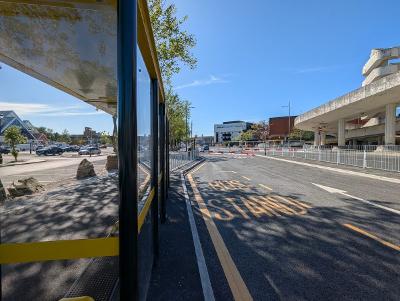 Temporary bus station One of the bus stands at the temporary bus station with road markings on the ground